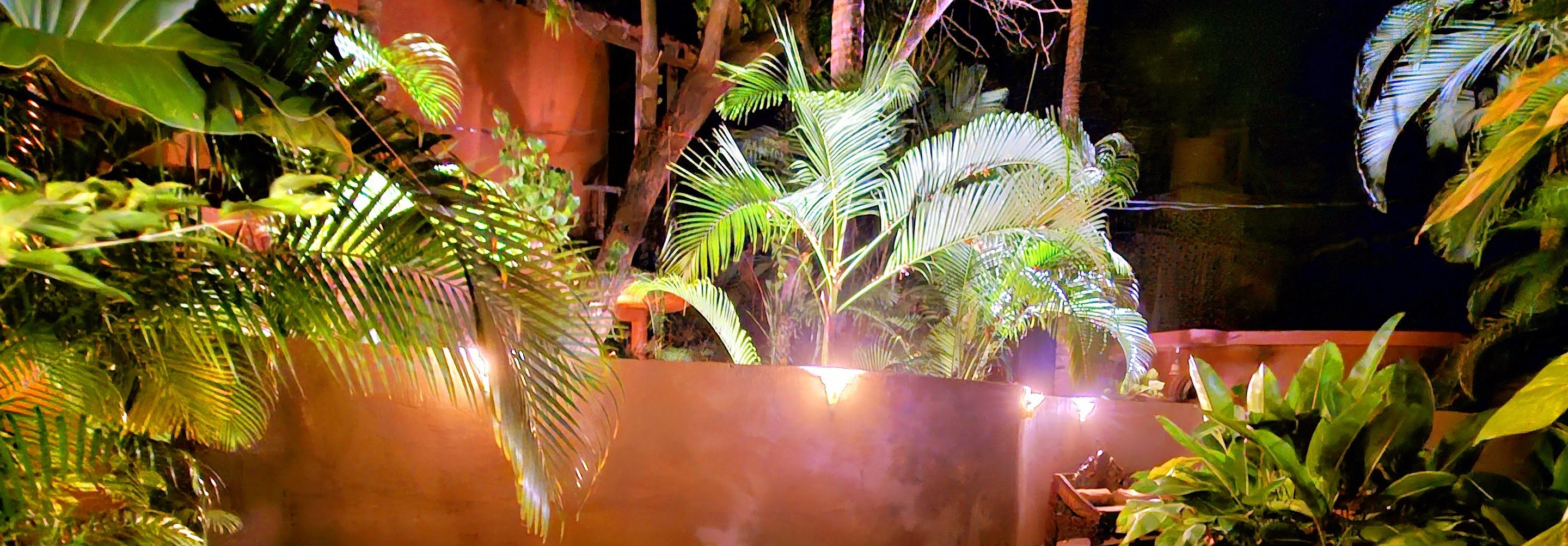 A softly lit gathering space at Ashiyana